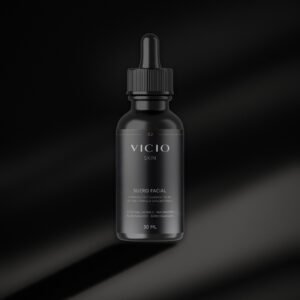 Suero facial VICIO Skin, frasco gotero negro con luz lateral